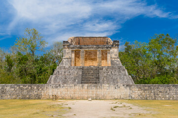 Fototapeta na wymiar Temple of the Bearded Man at the end of Great Ball Court for playing pok-ta-pok near Chichen Itza pyramid, Yucatan, Mexico. Mayan civilization temple ruins, archeological site