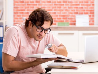 Naklejka premium Young student preparing for college exams