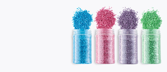 A set of cans with multicolored glitter crystal salt for aroma spa. Shimmering sea salt jars...