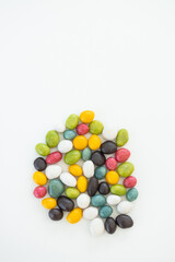 many different candies, sweets on white background