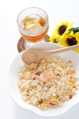Asian food, shrimp and vegetable fried rice on white plate with copy space
