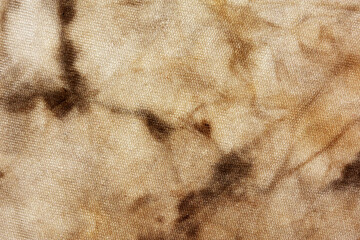 Old fabric with brown stains full frame for background, murder case idea, old blood stains on fabric,cream brown abstract