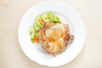 Homemade grilled chicken tight meat served with celery and carrot