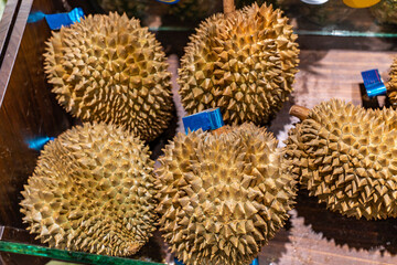 Naklejka na ściany i meble Fresh durians in the supermarket.