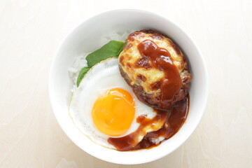 Homemade cheese hamburger patty and sunny side up fried egg with sauce for Hawaiian Locomoco rice image