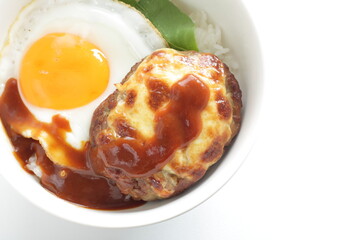 Homemade cheese hamburger patty and sunny side up fried egg with sauce for Hawaiian Locomoco rice image