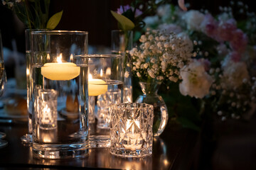 A candle on the table is on fire