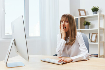Excited upset adorable blonde businesswoman worker close mouth by hand thinking of problem solution...