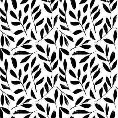Olive leaves and branches silhouettes seamless pattern. Hand drawn brush painted branches with long black leaves. Ink plant drawings. Natural organic ornament with black stems. Botanical background 