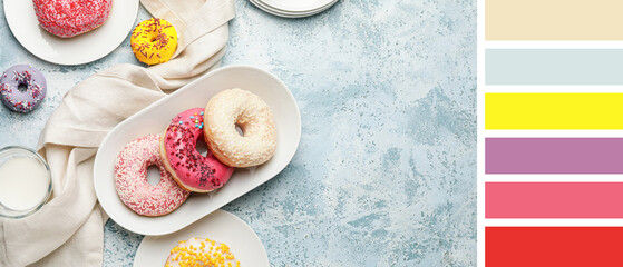 Many sweet donuts on light blue background. Different color patterns