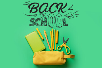 Pencil case with stationery and text BACK TO SCHOOL on green background