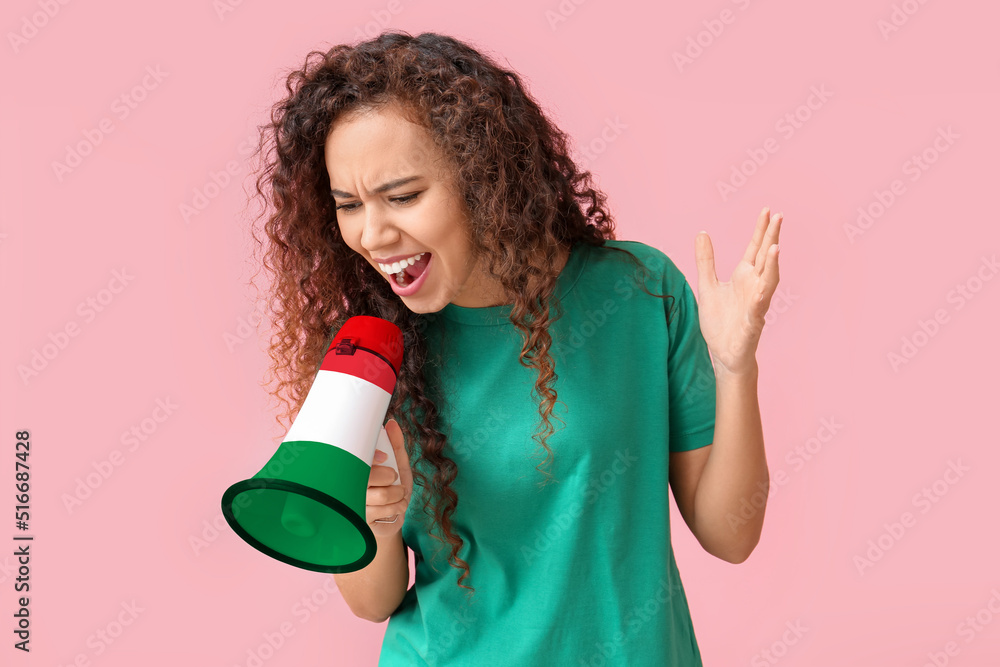 Sticker Young African-American woman with megaphone on pink background. Concept of studying Italian language