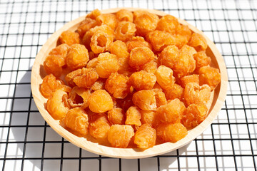 Dried longan on white background.