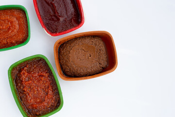 Korean chili paste on white background.