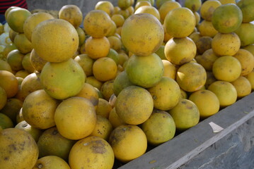 Oranges Piled in Pyramids