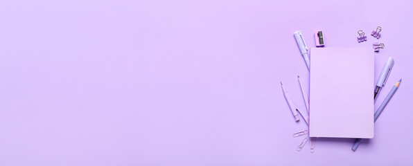 School stationery on lilac background with space for text, top view