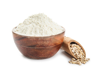 Bowl of flour and scoop with wheat grains on white background