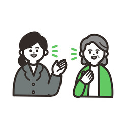 話し合うスーツの女性と高齢女性 green