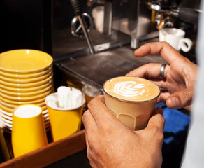 Latte coffee that has been made by the craftsmanship of the barista.