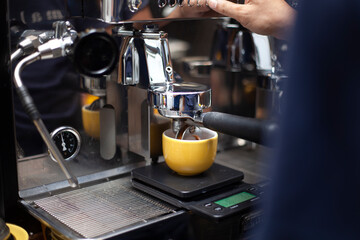 Espresso in a cup, which has been made with a coffee machine.