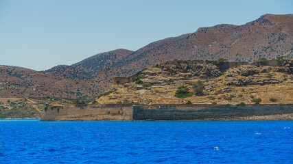 The island of lepers (Spinalonga) is an island in southern Greece and the second most visited tourist attraction in Crete .