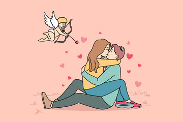 Cupid shooting with arrows in to happy couple kissing. Woman sitting on man hugging and cuddling. Love and relationship. Vector illustration. 