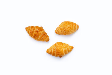 Tasty croissants on white background.