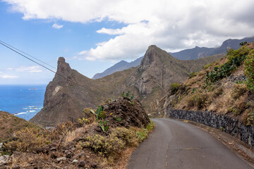 Scenic hiking trail leading to village Taganana with view on Roque de las Animas crag in the Anaga mountain range, north coast of Tenerife, Canary Islands, Spain, Europe. Path from Afur to Taganana