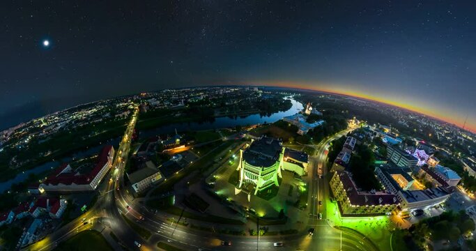 circular rotation with twisting of night landscape of city from the height of flight into tiny planet