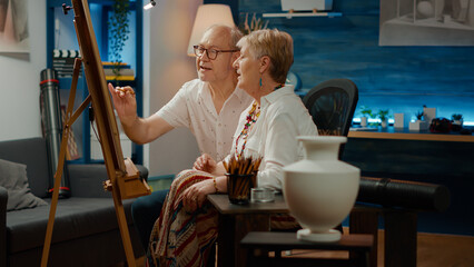 Retired man and woman doing teamwork to draw vase model with artistic skills and professional tools. Drawing artwork masterpiece with inspiration design and creativity, sketch.