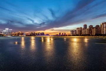 Foto op Canvas Asphalt road and city skyline with modern building at night in Suzhou, China.  © ABCDstock