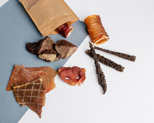 Natural dried treats for dogs. Treats for rewarding and training dogs. Dried meat products for...