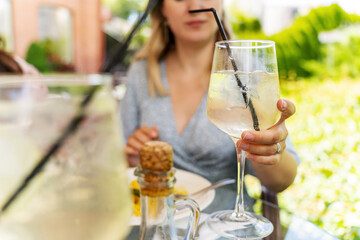 Making celebratory toast with summer cocktails