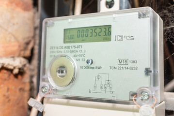 Smart electric power meter counter measuring power usage.Close-up of modern smart grid residential...
