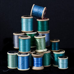 Wooden spools of threads