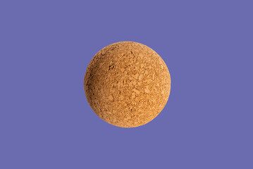 Nice brown cork ball isolated on the veri peri purple background,close up,selective focus.Advertisement.Copy space.