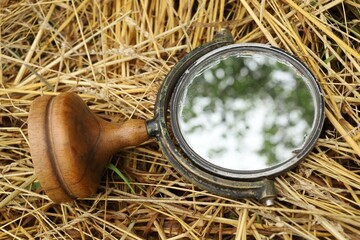 Old mirror on the hay