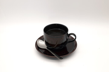 Black coffee in a black glass set,Include Clipping Path.
