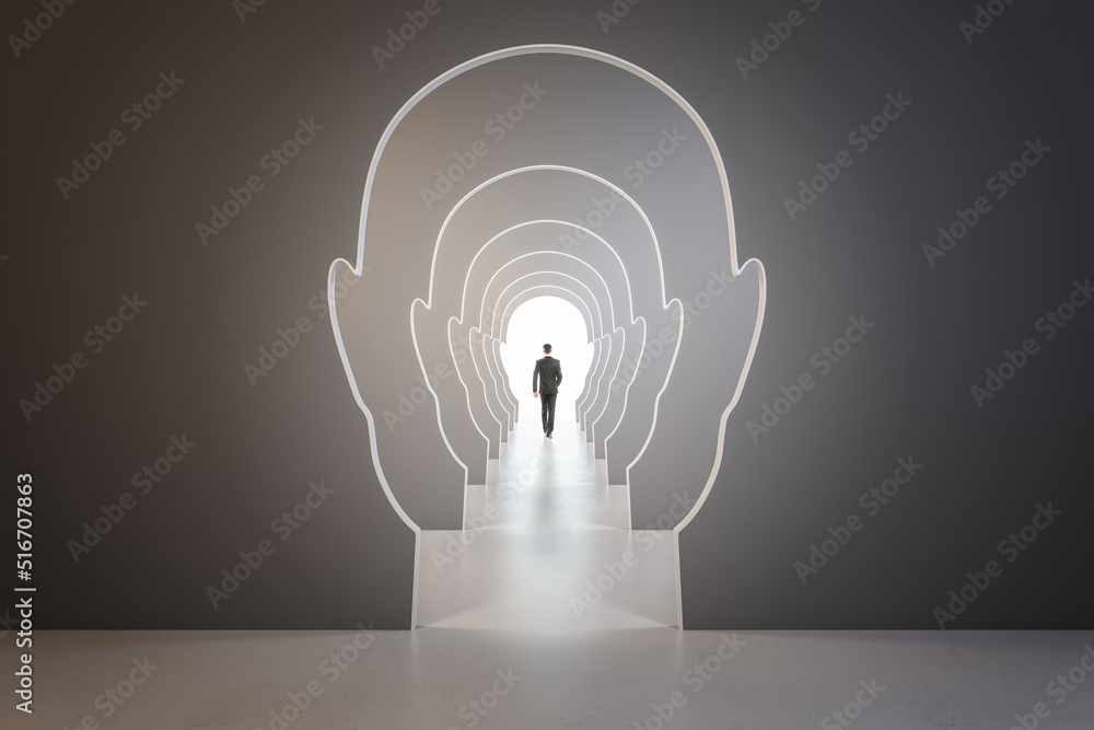 Poster creative image of businessman walking through head outline corridor. thinking, maze, solution and an