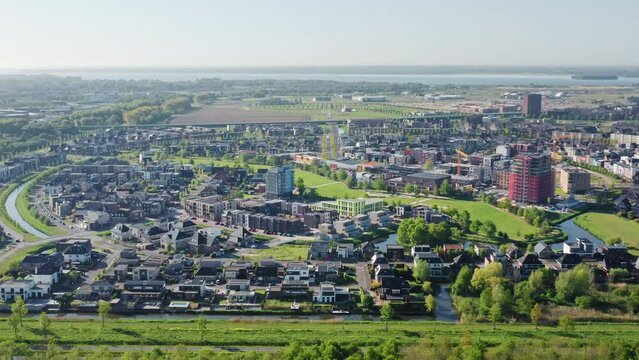 Almere Poort district in a new green growing city in The Netherlands, province Flevoland, suburb of Amsterdam. Aerial drone shot.