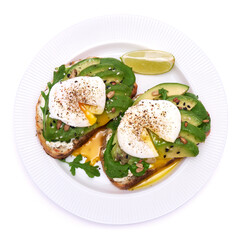 Freshly made poached egg and Avocado toasts isolated on white background