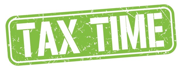 TAX TIME text written on green stamp sign.