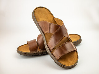 Summer shoes for males. Two brown leather fashion sandals.