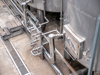 Steel tanks or reservoirs with pipes, food industry.