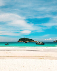 Boats, turquoise water and white sand beach, Redang Island, Malaysia
