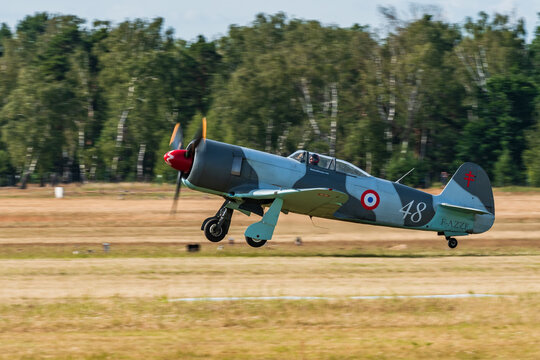 Leszno, Poland - June, 17, 2022: Antidotum Airshow Leszno, Yak-3 Soviet World War II fighter plane. The pilot of the plane is gaining speed taking off from the airport.