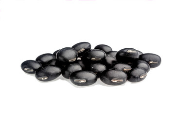 Black beans (Urad dal, black gram, vigna mungo) isolated on white background