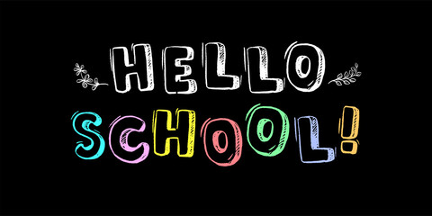 The inscription in colored chalk on the blackboard - Hello school!