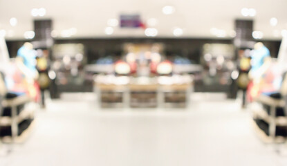 Abstract blur clothing boutique display interior of shopping mall background