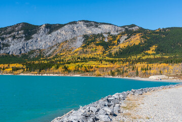 Fall colors and blue lake in Kananaskis in Alberta, Canada 